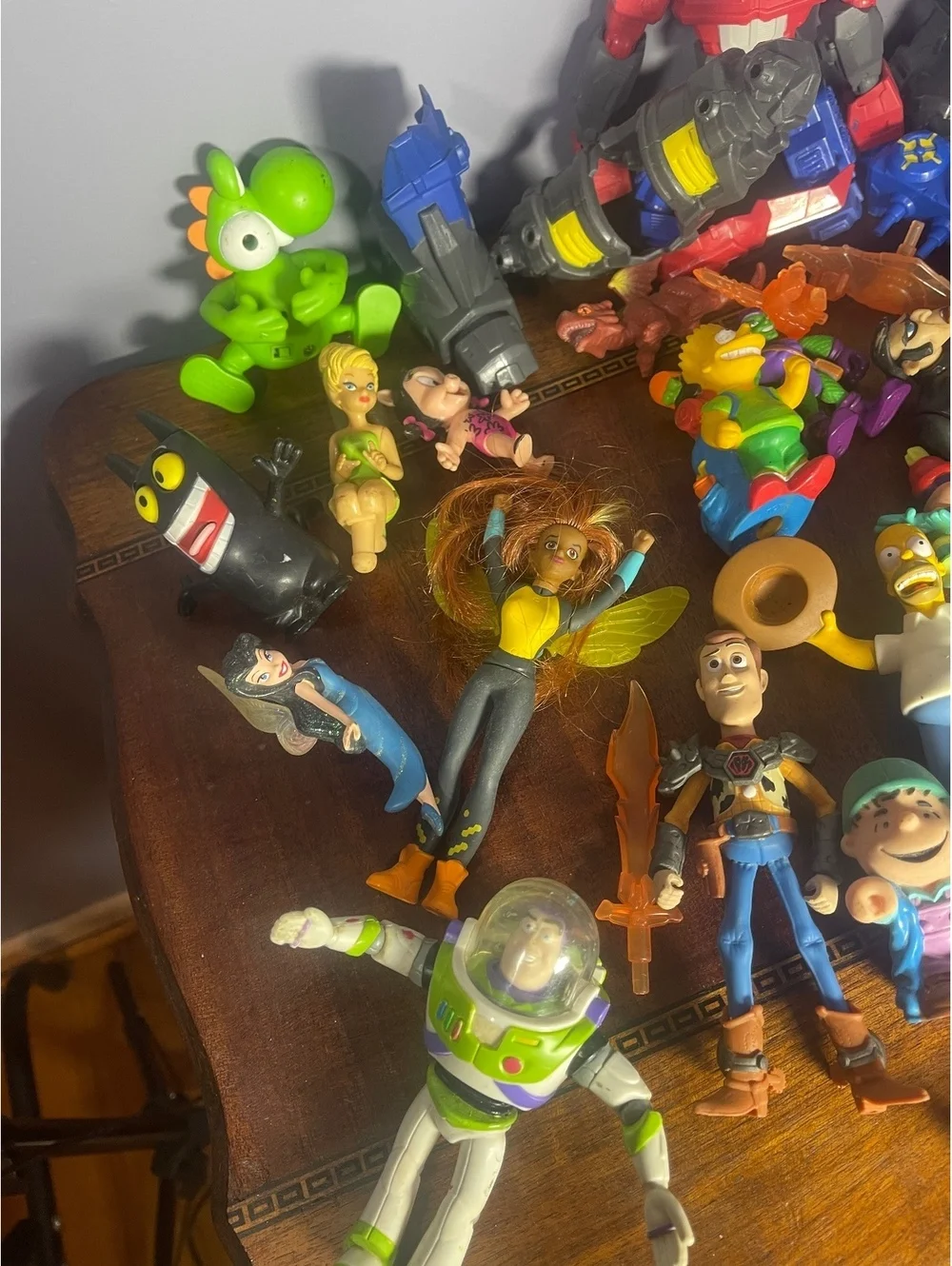Mixed Lot of Vintage and Modern Action Figures Including Transformers, Simpsons,